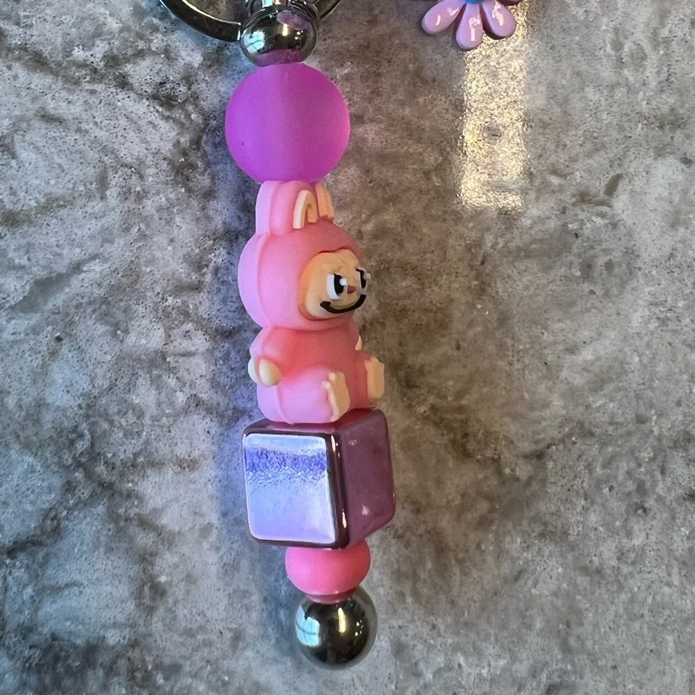 Pink Silicone Labubu Keychain with Pom Pom and Floral Accent - Picture 5 of 8